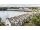 Aerial view of waterfront townhouses with a view of the lake and surrounding city at 4926 Lake Palmetto Ln, North Charleston, SC 29418