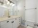 Clean bathroom featuring white cabinets, a sink and vanity, and a walk in shower at 4926 Lake Palmetto Ln, North Charleston, SC 29418