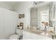 Bright bathroom with a shower and a decorated vanity featuring tasteful accents and a neutral color palette at 540 Castle Hall Rd, Mount Pleasant, SC 29464