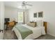 Comfortable bedroom with a full-sized bed, desk, and serene decor at 540 Castle Hall Rd, Mount Pleasant, SC 29464
