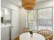 Bright breakfast nook adjacent to the laundry, featuring a round table and natural lighting at 540 Castle Hall Rd, Mount Pleasant, SC 29464