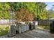 Outdoor kitchen area with grill and counter space, ideal for outdoor cooking and entertaining in a lush backyard setting at 540 Castle Hall Rd, Mount Pleasant, SC 29464