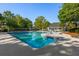 Large community swimming pool surrounded by lush greenery and comfortable lounge chairs, perfect for relaxation and recreation at 540 Castle Hall Rd, Mount Pleasant, SC 29464