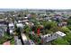 Aerial view of a neighborhood with lush greenery and rooftops, indicating property location at 55 Laurens St # A, Charleston, SC 29401