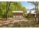Charming brick home with a three car garage and a fenced yard, perfect for outdoor activities and relaxation at 5680 Dixie Plantation Rd, Hollywood, SC 29449