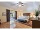 Serene main bedroom with hardwood floors, connecting to a bright exercise room at 5680 Dixie Plantation Rd, Hollywood, SC 29449