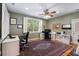 Bright office space with hardwood floors, large windows, and ample desk space for a productive work environment at 5680 Dixie Plantation Rd, Hollywood, SC 29449