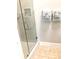 The renovated bathroom boasts a walk in shower, tile flooring and modern finishes at 5691 Captain Kidd Rd, Hollywood, SC 29449