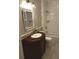 This bathroom features a tile shower, a vanity and updated finishes at 5691 Captain Kidd Rd, Hollywood, SC 29449