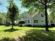 Charming home with a well-maintained lawn and attractive landscaping, creating a peaceful outdoor space at 5691 Captain Kidd Rd, Hollywood, SC 29449