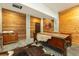 Finished basement with wood paneling, accent lighting, and unique design features at 6440 St Anthony Dr, Hollywood, SC 29449