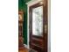 Elegant foyer featuring a stained glass front door and a vintage grandfather clock at 6440 St Anthony Dr, Hollywood, SC 29449