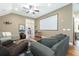 Spacious living room with hardwood floors, neutral paint and ample seating space at 6440 St Anthony Dr, Hollywood, SC 29449