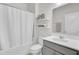 Bathroom featuring a shower and tub combo, a vanity with sink, and shelving at 648 Chigwell Springs Ln, Summerville, SC 29486