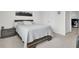 Bedroom with queen bed, nightstand, and double closets; desk visible in doorway at 648 Chigwell Springs Ln, Summerville, SC 29486