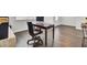 Comfortable office featuring hardwood floors, an executive style chair and a work space at 648 Chigwell Springs Ln, Summerville, SC 29486