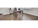 Hardwood flooring in a home office setting with a traditional desk and natural light at 648 Chigwell Springs Ln, Summerville, SC 29486