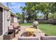 Backyard deck featuring multiple seating areas, a grill, and backyard access at 733 Longfellow Rd, Charleston, SC 29407