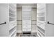 Organized walk-in closet with custom shelving, drawers, and ample storage space at 733 Longfellow Rd, Charleston, SC 29407