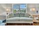 Bright living room with comfortable seating and bright light, showcasing the warm hardwood flooring at 733 Longfellow Rd, Charleston, SC 29407