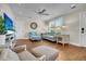 Bright living room with hardwood floors, a ceiling fan, comfortable seating, and lots of natural light at 733 Longfellow Rd, Charleston, SC 29407