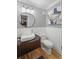 This bathroom has modern fixtures, with decorative wallpaper and stylish design at 739 Wildwood Rd, Charleston, SC 29412