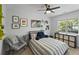 Inviting bedroom with comfortable bedding, decorative pillows, and natural light at 739 Wildwood Rd, Charleston, SC 29412