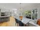 A full kitchen and dining area with a view of the outdoors is bright and airy at 739 Wildwood Rd, Charleston, SC 29412