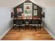 Office featuring two person desk setup, hardwood floors and overhead lighting at 739 Wildwood Rd, Charleston, SC 29412