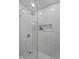 Shower with white subway tile, glass door, and niche for toiletries at 739 Wildwood Rd, Charleston, SC 29412