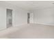Bright, carpeted bedroom with neutral walls and doors to the ensuite bathroom at 755 Maynard Ln, Summerville, SC 29486