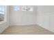 Dining room with light wood floors, white trim, and classic wainscotting at 755 Maynard Ln, Summerville, SC 29486