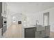 Spacious kitchen featuring modern appliances, quartz countertops, and an open view to the living area at 755 Maynard Ln, Summerville, SC 29486