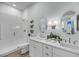 Bathroom featuring double sink vanity, walk-in shower, and modern decor for a spa-like experience at 7621 Indigo Palms Way, Johns Island, SC 29455