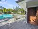 Community pool with bar, outdoor shower, and lounge chairs on the patio at 7621 Indigo Palms Way, Johns Island, SC 29455