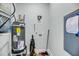 Functional utility room with water heater, HVAC system, and laundry connections for convenience at 7621 Indigo Palms Way, Johns Island, SC 29455