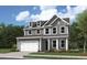 Beautiful two-story home with gray siding, white trim, and an attached two-car garage at 767 Maynard Ln, Summerville, SC 29486