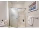Bathroom featuring a framed shower, tiled walls, and modern fixtures at 777 Hamlet Cir, Goose Creek, SC 29445