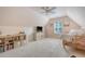 Large bedroom featuring soft carpet, a rattan daybed, a ceiling fan, and a large storage unit at 777 Hamlet Cir, Goose Creek, SC 29445