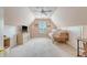 Spacious bedroom featuring a rattan daybed, soft carpet, a ceiling fan, and a large storage unit at 777 Hamlet Cir, Goose Creek, SC 29445