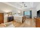 Spacious primary bedroom featuring a tray ceiling, ceiling fan, and neutral paint at 777 Hamlet Cir, Goose Creek, SC 29445