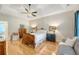 Spacious primary bedroom featuring a tray ceiling, ceiling fan, and neutral paint at 777 Hamlet Cir, Goose Creek, SC 29445