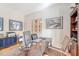 Bright office space with wood desk, shelving, and sporty Dallas Cowboys decor at 777 Hamlet Cir, Goose Creek, SC 29445