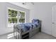 Comfortable bedroom featuring a twin bed and a large window offering natural light at 79 Rivers Point, Charleston, SC 29412