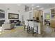 Open floorplan with a kitchen island, tile floor, with seating that views into the living room at 79 Rivers Point, Charleston, SC 29412
