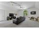 Spacious living room with a large window, vaulted ceiling, and ample seating at 79 Rivers Point, Charleston, SC 29412