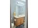 A bathroom featuring a single vanity, toilet and gray floor mat at 8107 Old London Rd, North Charleston, SC 29406