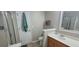 Well-lit bathroom with a vanity, large mirror, linen closet, and glass enclosed shower at 8107 Old London Rd, North Charleston, SC 29406