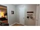 Hallway features hardwood flooring, and decor offering a warm welcome at 8107 Old London Rd, North Charleston, SC 29406