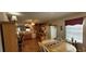 Spacious kitchen with ample counter space, wooden cabinets, and seamless flow to the dining area at 8107 Old London Rd, North Charleston, SC 29406